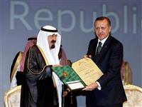 Erdoğan ödülünü aldı