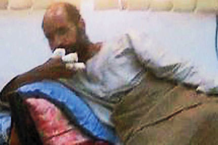 Oğul Kaddafi de elde