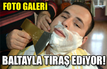 Baltayla tıraş ediyor!-1