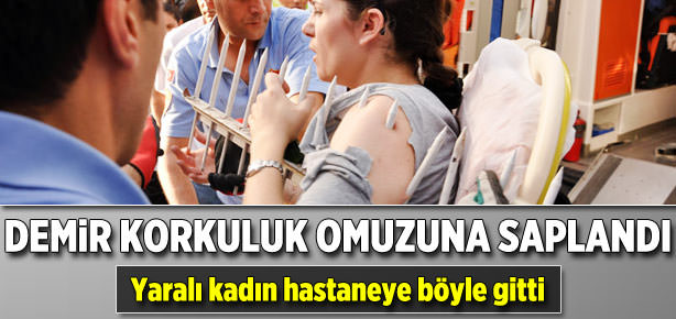 Demir korkuluk omuzuna saplandı