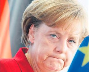 Merkel’in kulakları kocaman