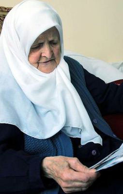 Evine Erdoğan fotoğrafı astı şiddet gördü