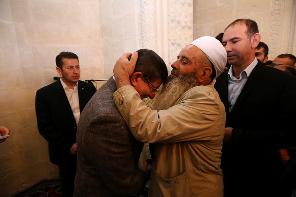 Davutoğlu'ndan kardeşlik çağrısı