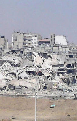 Suriye rejimi şehirleri patlayıcılarla yıkıyor