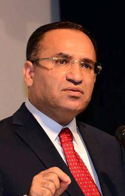 Bozdağ: Merkel'i kutluyorum