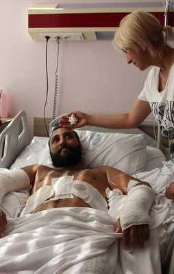 Darbeye direnen genci ikinci kattan attılar