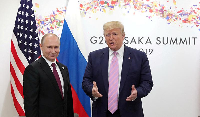 Rusya Devlet Başkanı Vladimir Putin ve ABD Başkanı Donald Trump, Reuters