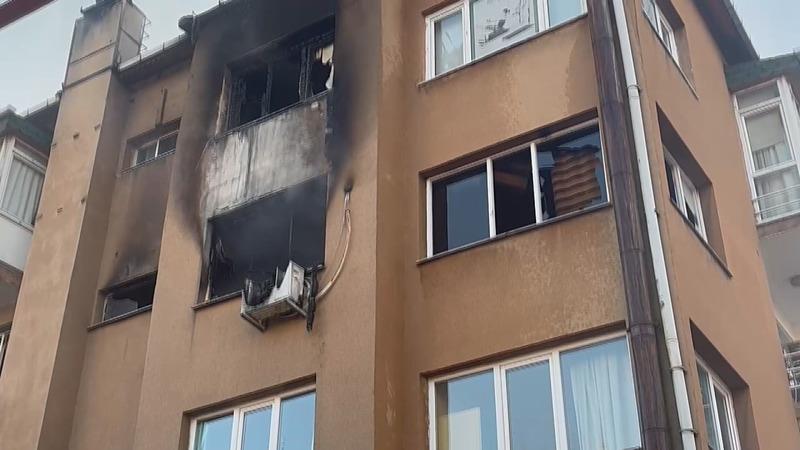 Kartal'da 5 katlı binada çıkan yangında bir itfaiye eri 2 kişi yaralandı. (DHA)