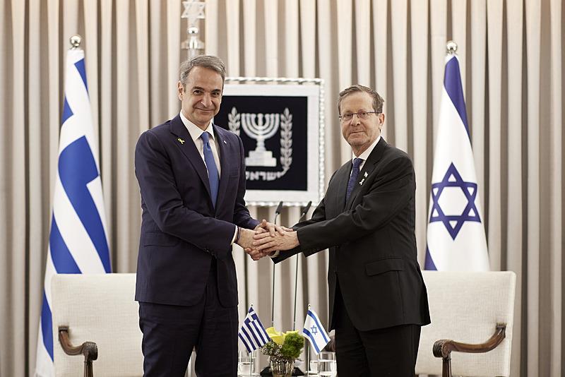 Miçotakis ve Herzog, DHA