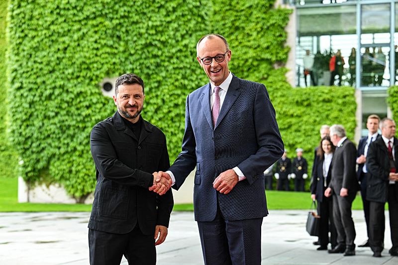 Zelenskiy ve Merz, Reuters