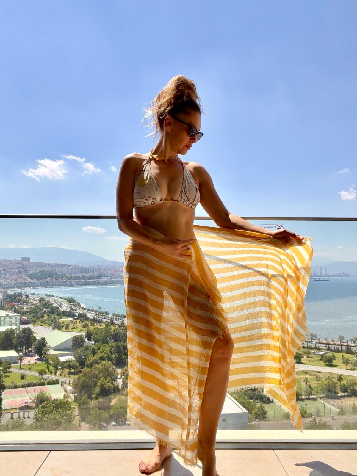 1784452115620.jpg Evrim Alasya'dan deniz kenarında bikinili tatil pozu! "Temmuz..." notuyla paylaştı-4
