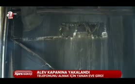 Telefon için yanan eve girdi!