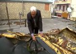 Rus katliamının izlerini gelecek nesiller için saklıyor